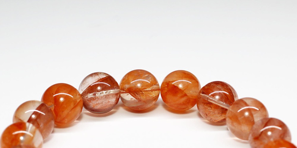 ライモナイトインクォーツブレスレット（約11mm玉・オレンジレッド