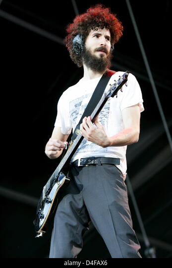 Guitarist Brad Delson of the band Linkin Park performs in concert