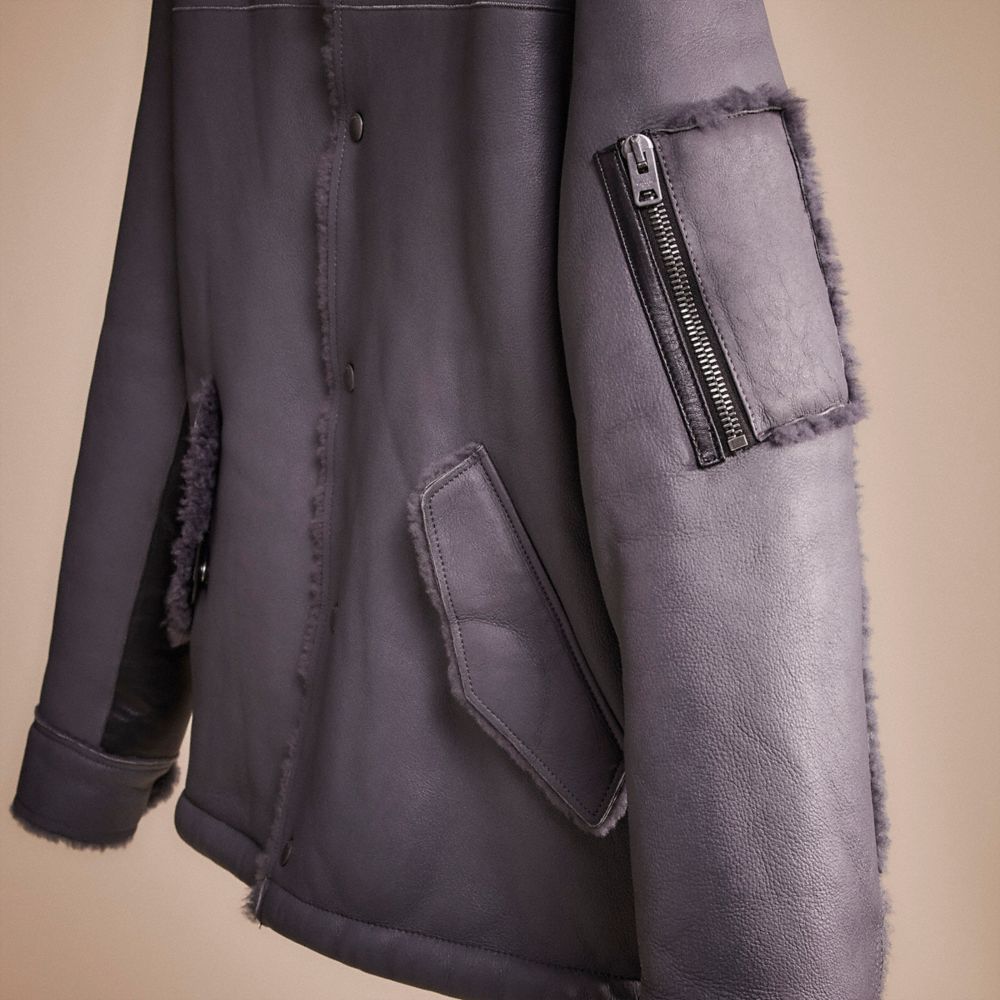 COACH® | Restored Shearling Snap Front Jacket