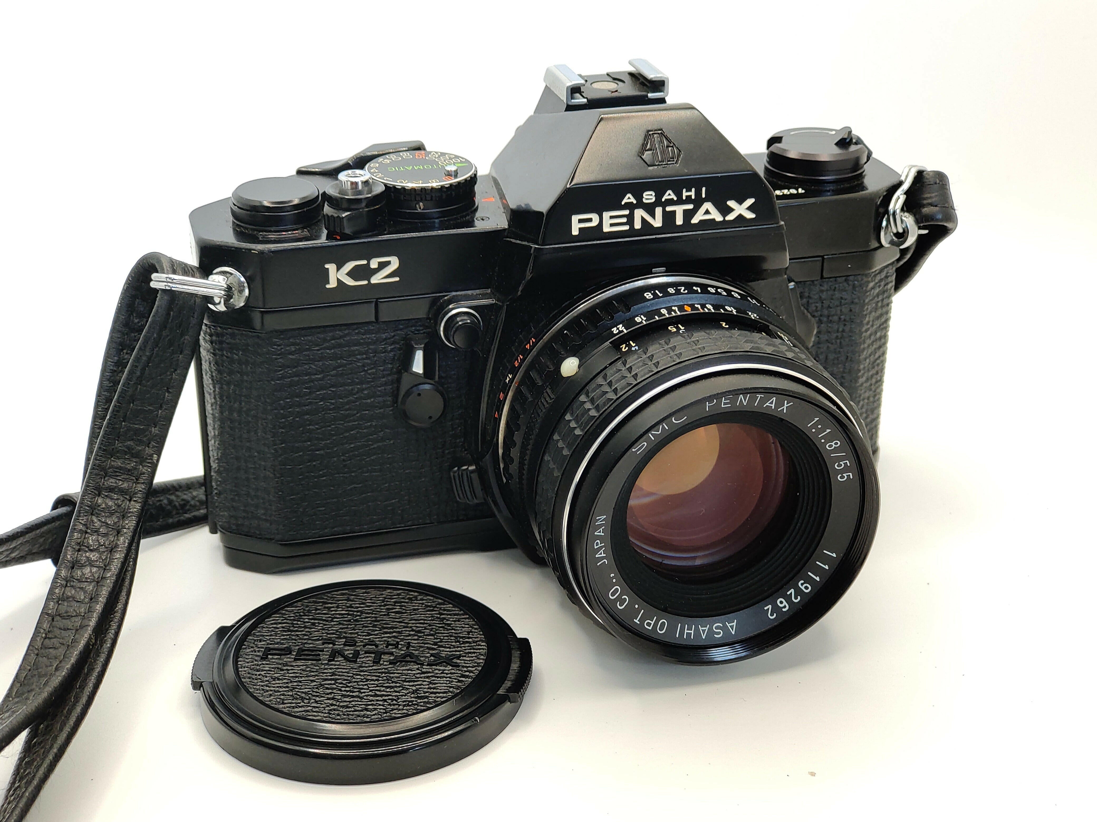 Pentax K2 SLR film camera with 55mm f/1.8 lens and case. In superb