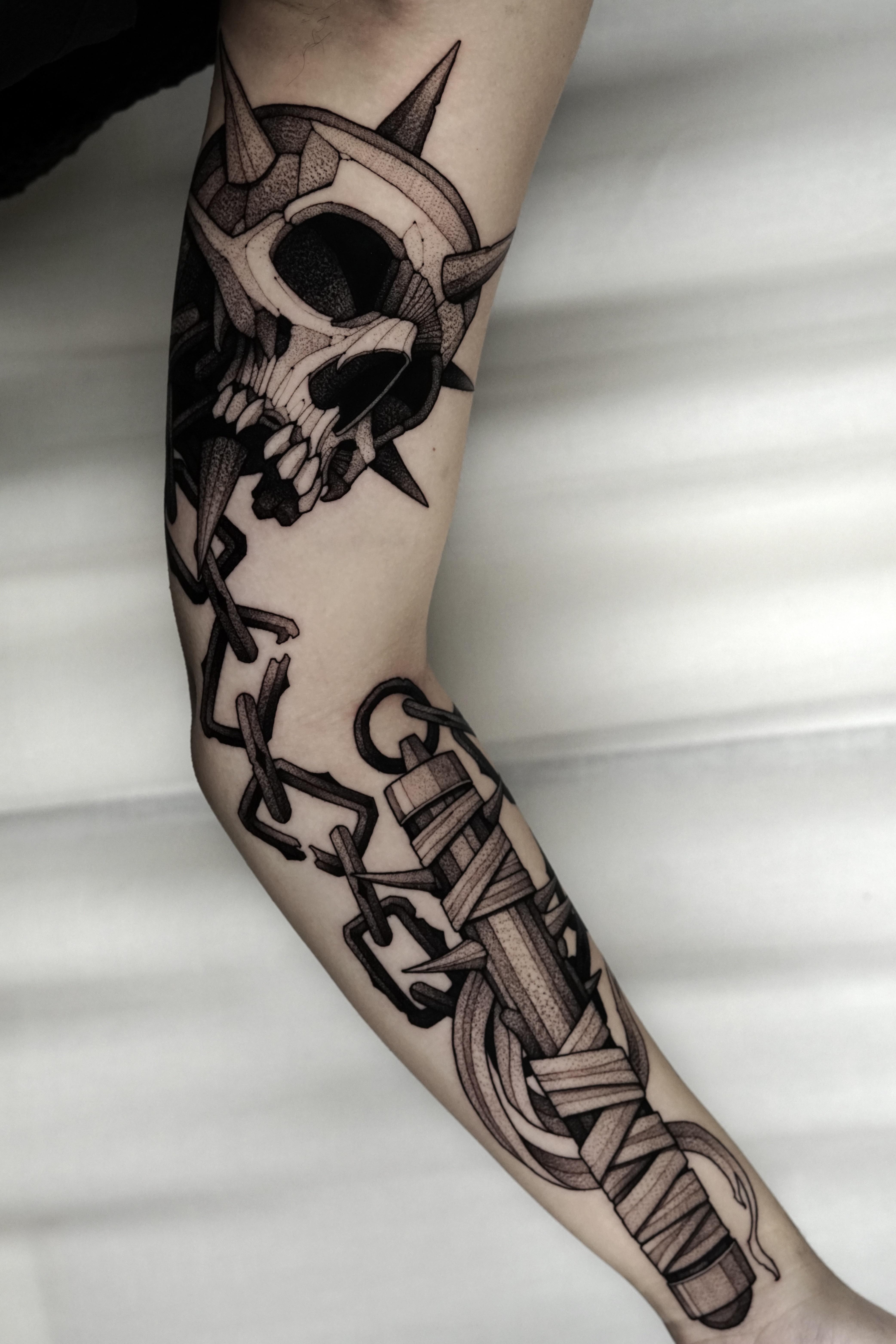 Blackwork skull flail done by Max LaCroix at Akara Arts in