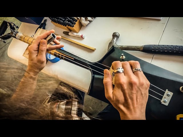 Justin Johnson 3 strings shovel guitar