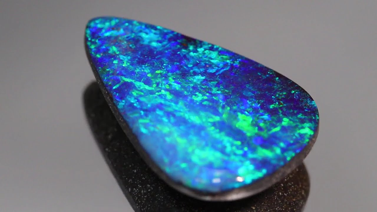 青い斑の浮かぶ魅力的なオレンジオパール73.5ct/ファイアオパール/鉱物