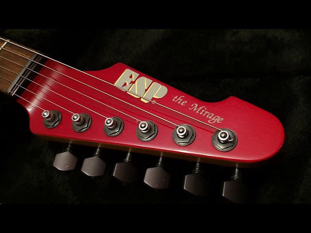 Esp Custom Guitars: The Mirage Deluxe Red Ash Wilkinson Tremolo Up