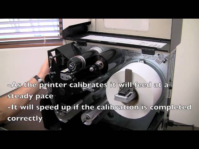 How To load a Zebra 110 xi 4 label - YouTube