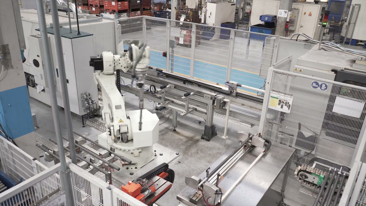A Kawasaki ZX130L robot in machine tends multiple CNC machines for