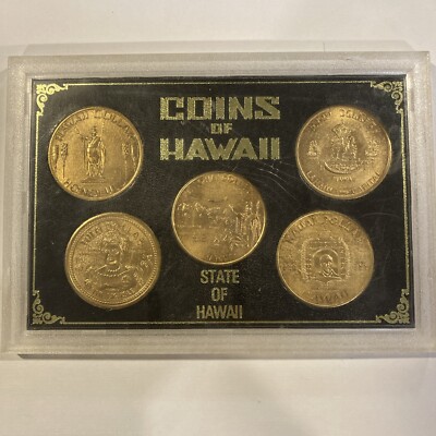 COINS OF HAWAII FIVE TOKEN DOLLAR SET IN ORIGINAL FRAME AND SLEEVE