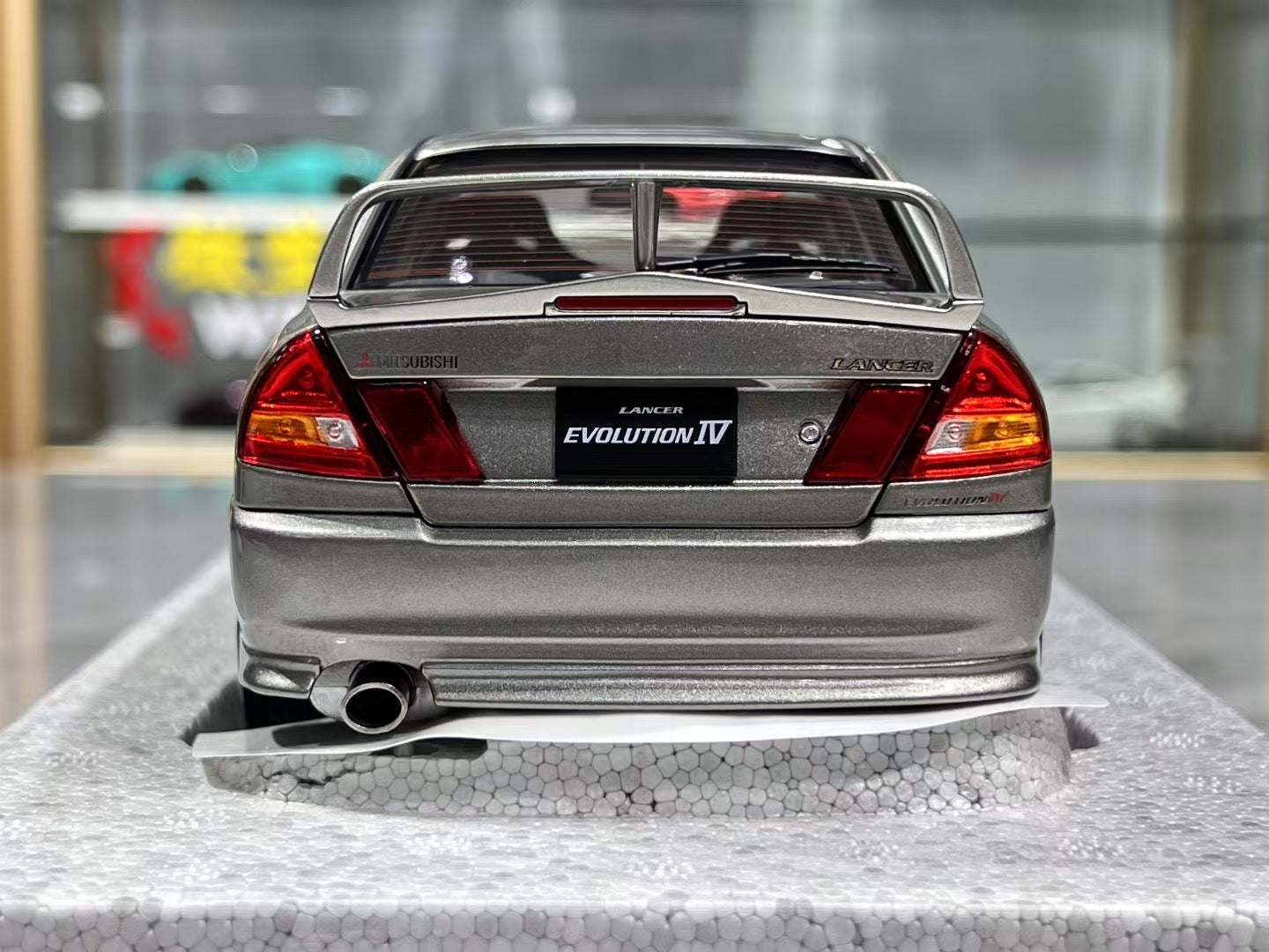 MotorHelix Mitsubishi Lancer EVO IV 1/18 – IronCookie Diecasts