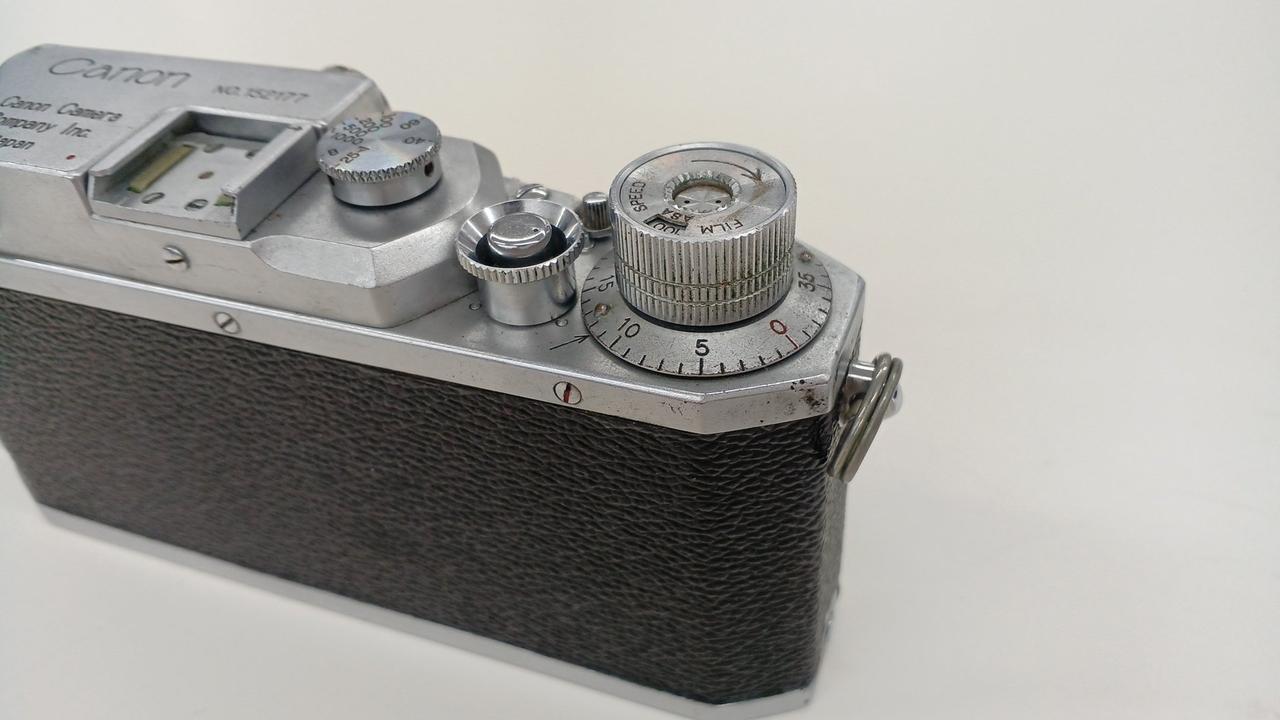 〇Nb右1058 キャノン フィルムカメラ No.154374 レザーケース付 〇Nb右1058