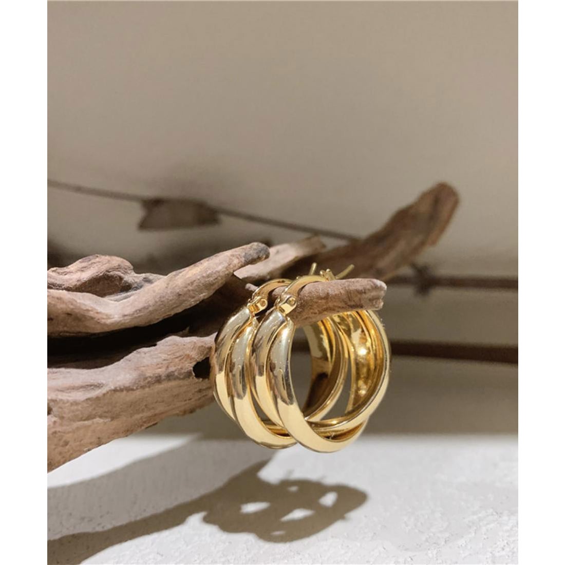 フォースメント Forcement ツイストデザインフープピアス （ゴールド