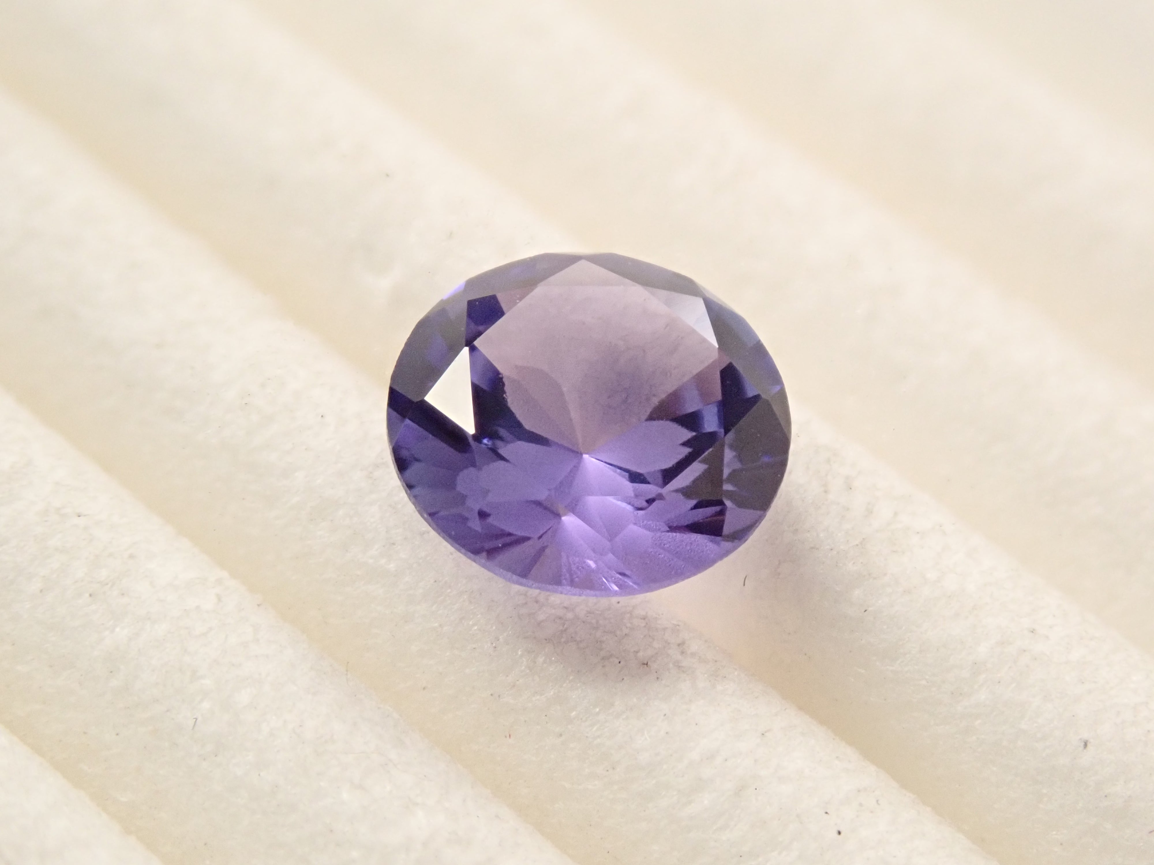 天然タンザナイトオーバル[ML8lI] ルース 0.61カラット さくらイン