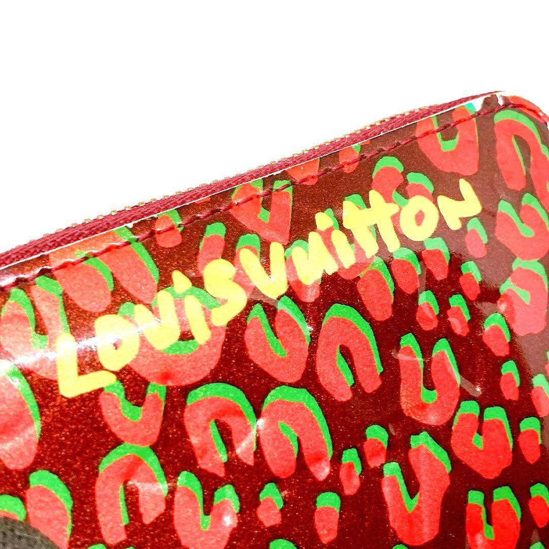 818 ルイヴィトン モノグラム　レオパード　折り財布　ジッピーパース