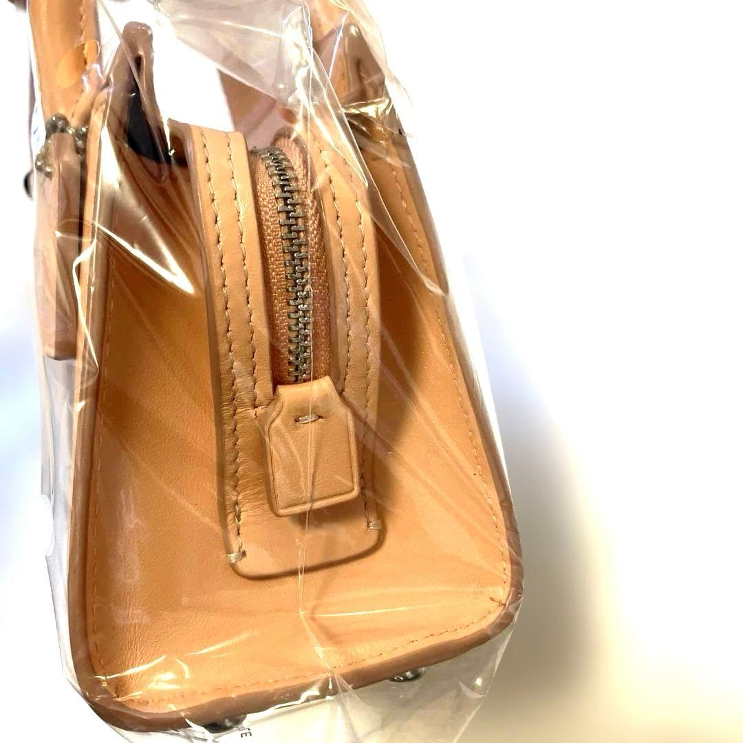 COACH サーモンピンク ハンドバッグ