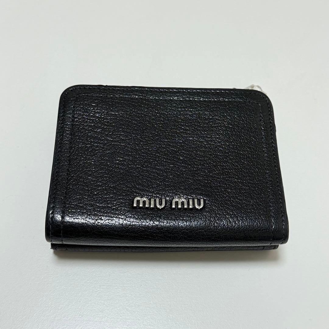 miumiu レア 二つ折り財布 ビジユーつき - メルカリ