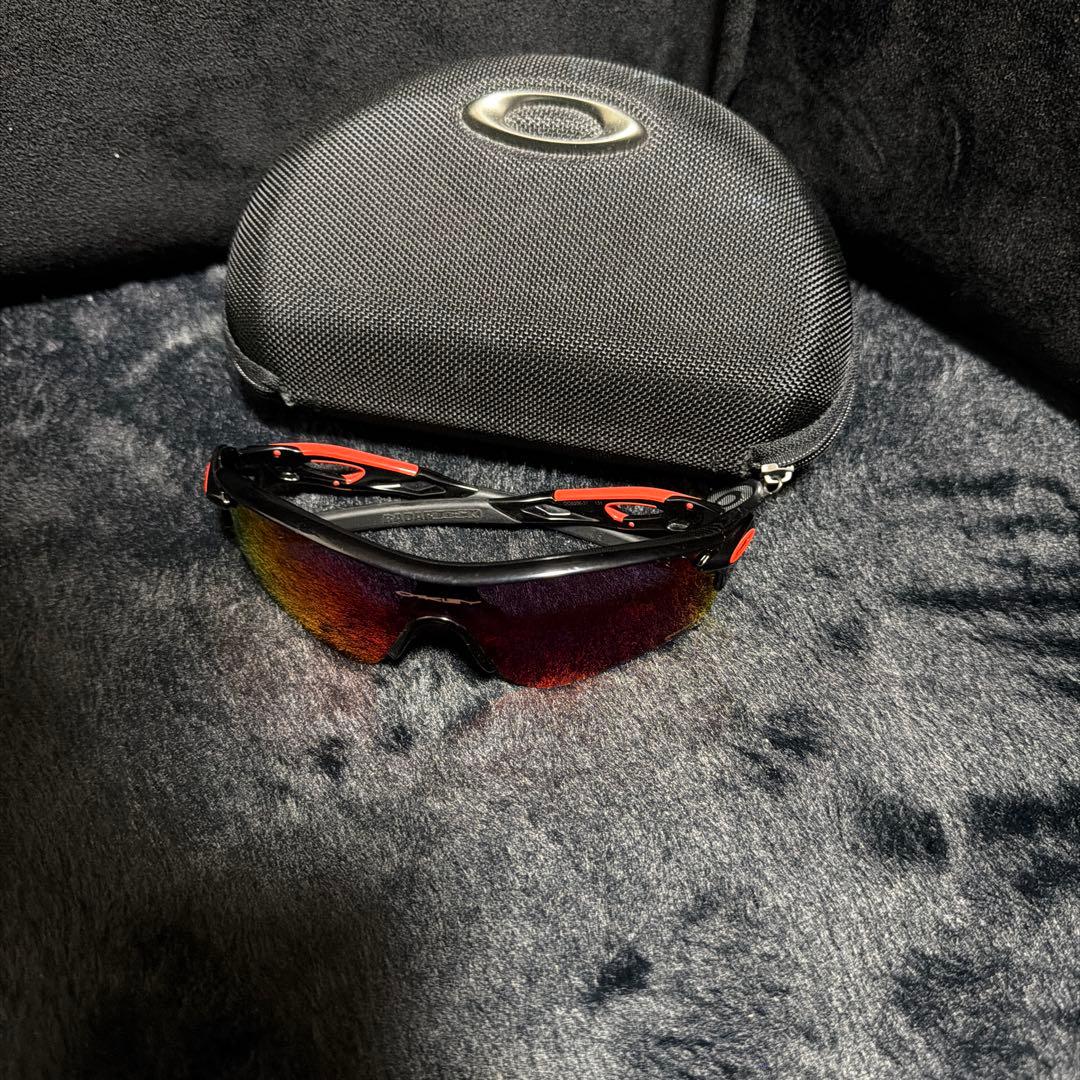 Oakley スポーツサングラス レッド/ブラック - メルカリ