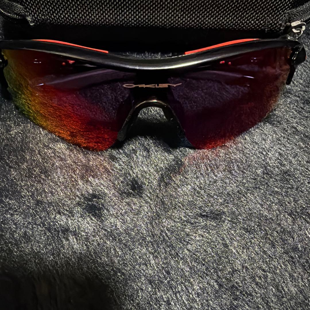 Oakley スポーツサングラス レッド/ブラック - メルカリ