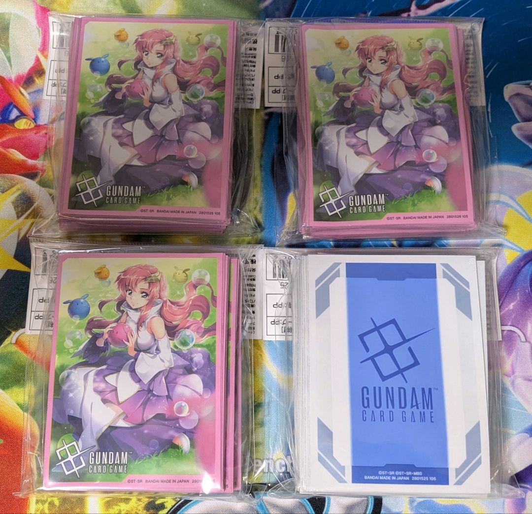 【新品・未開封】ガンダムカードゲーム スリーブ 溢れる慈愛＋ロゴ 4点セット スリーブ販売】ガンダムカードゲーム オフィシャルスリーブ01 『溢れる