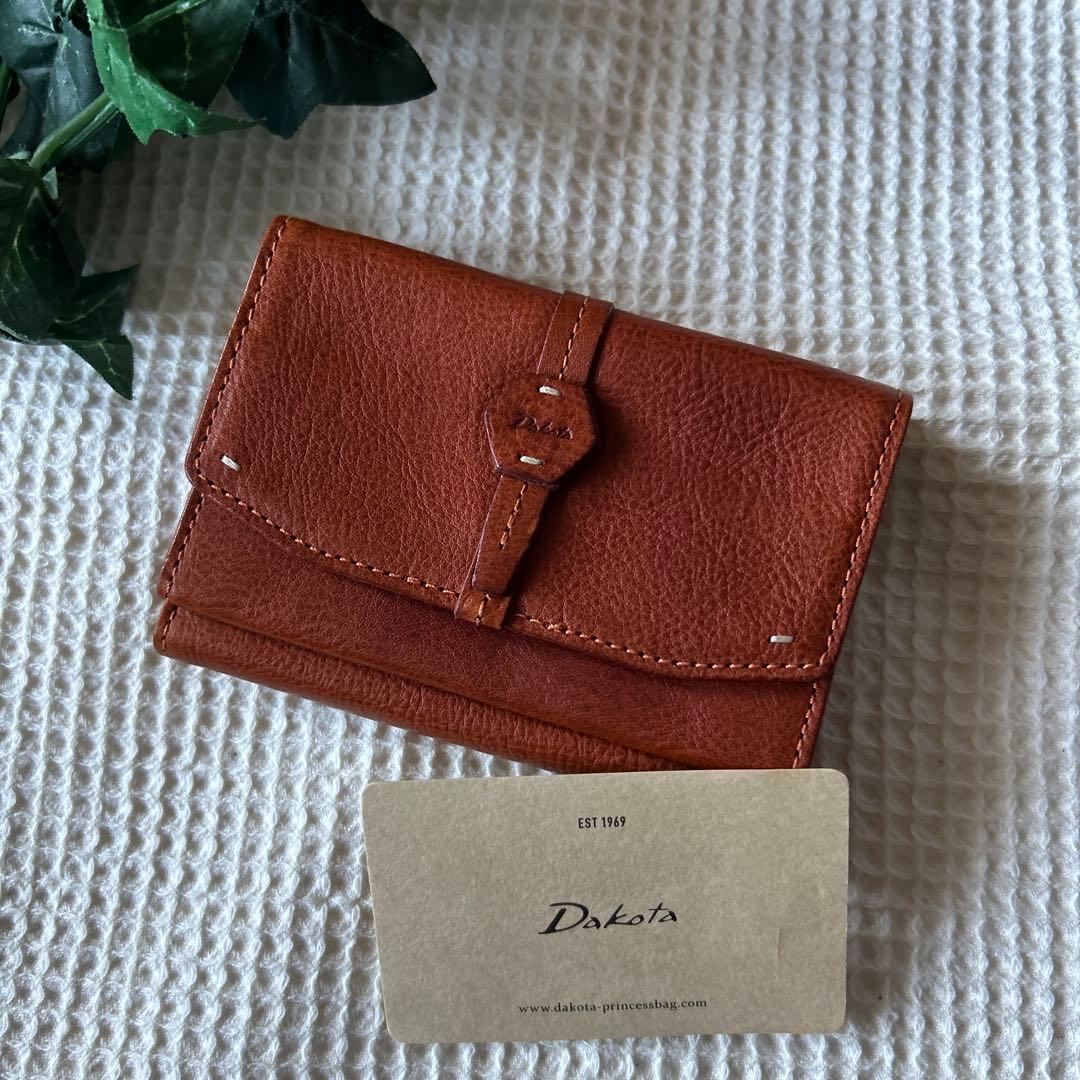 新品Dakota 二つ折り牛革財布 ブラウンお勧め