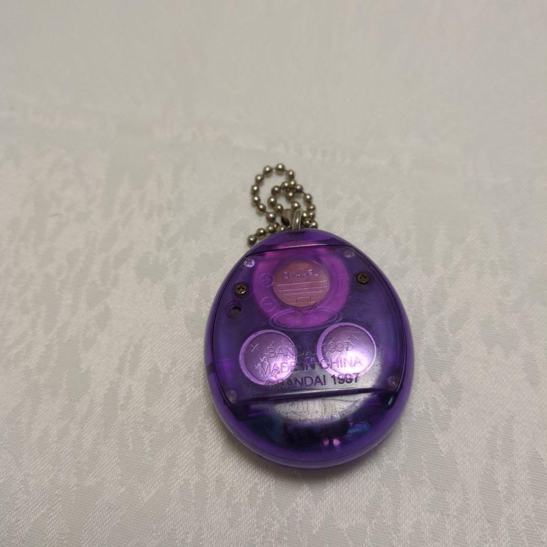 BANDAI 海で発見!!たまごっち(紫) - メルカリ