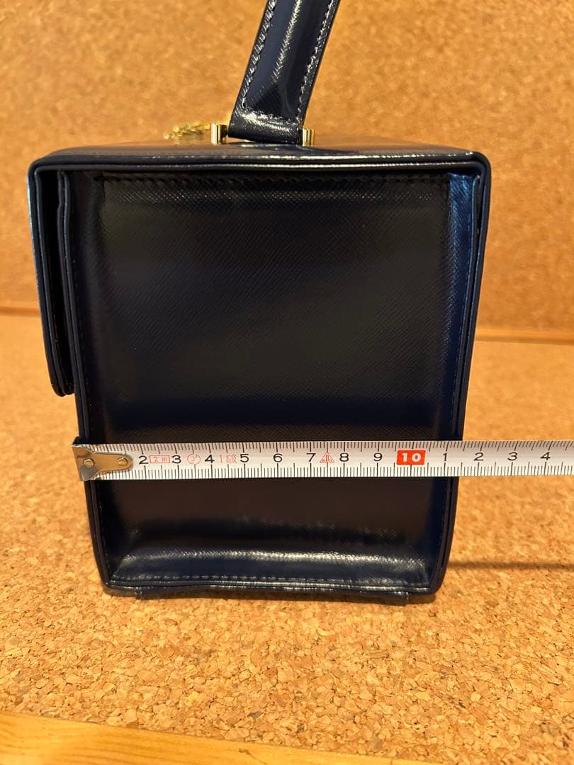 美品ヴェルサーチハンドバッグバニティバッグ　青　チャームつき