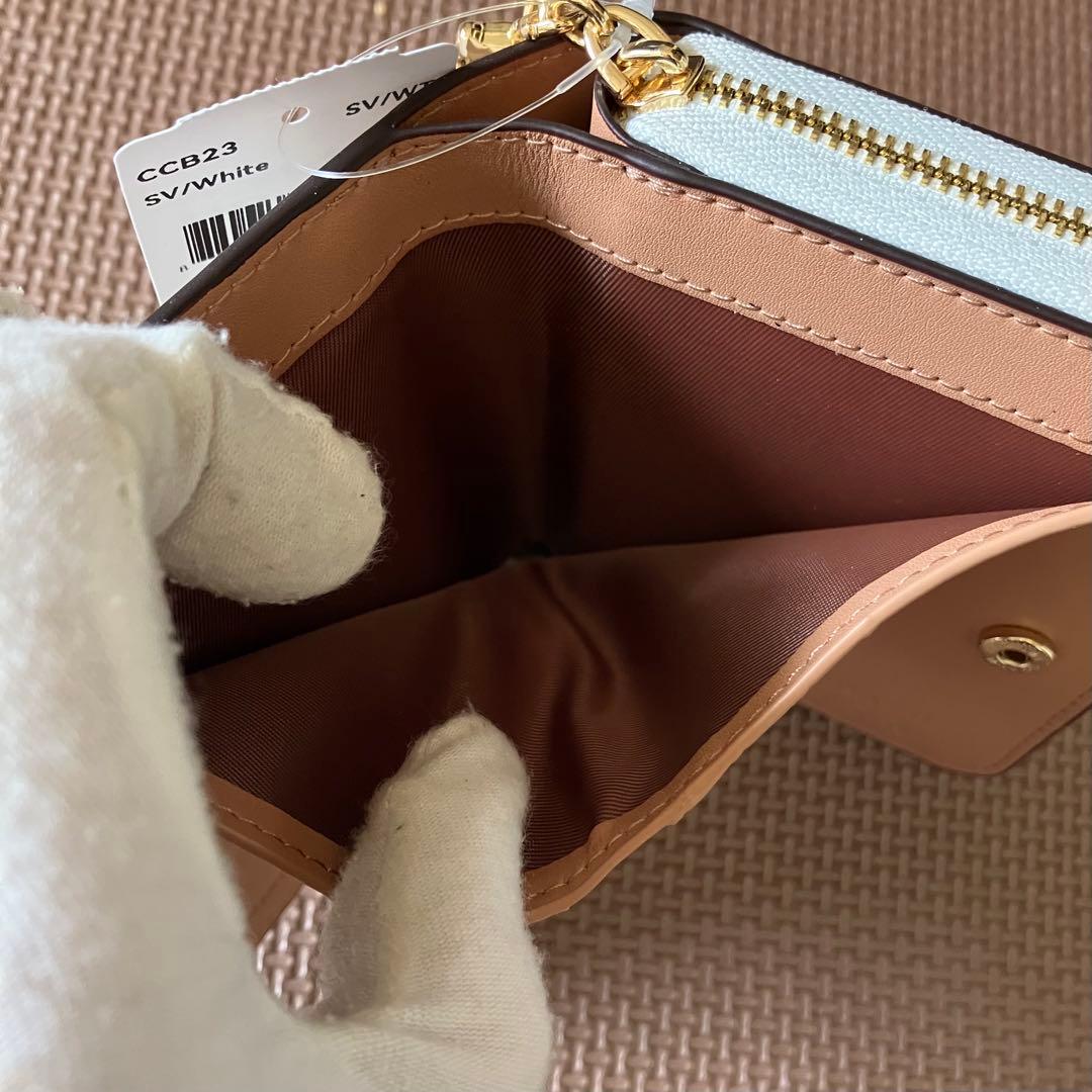 【大人気】【COACH X PEANUTS】ビルフォールドウォレット チョーク