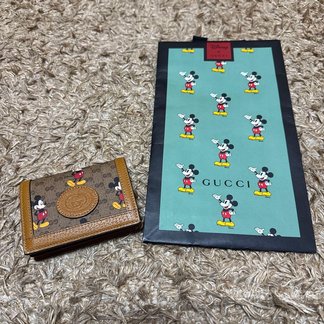 美品】グッチGUCCI 二つ折り財布 DISNEYxGUCCIコラボ 日本限定 - メルカリ