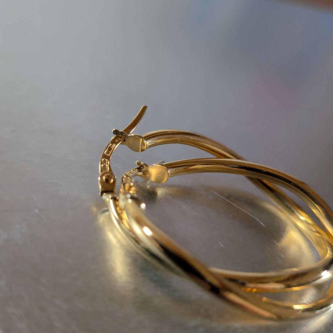 ピアス　UNOAERRE　750　YG　スナップ　ウェーブ　2.59g