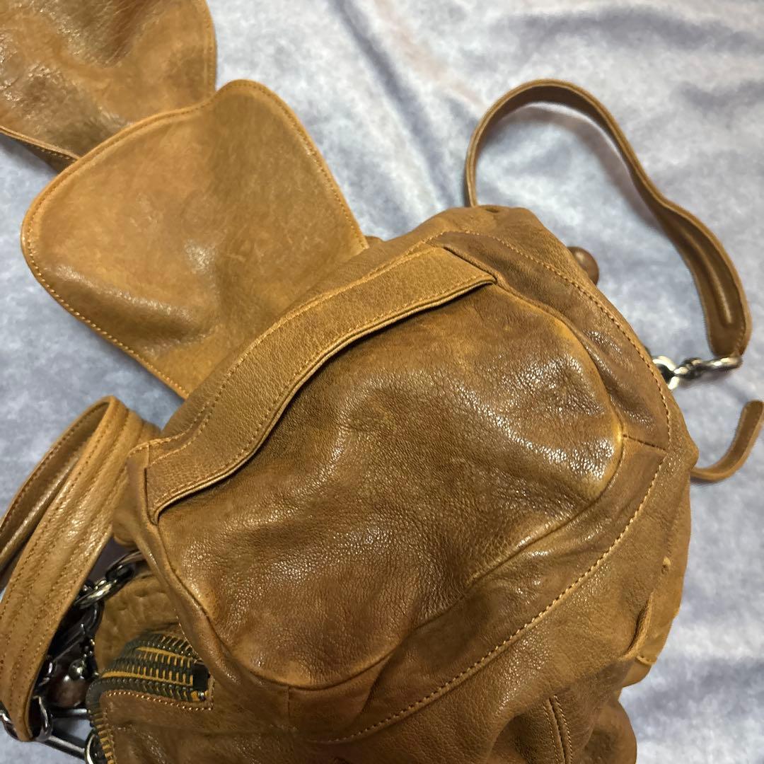 ジャマンピュエッシュ　レザー　ハンドバッグ　木製パーツ　がま口　総柄