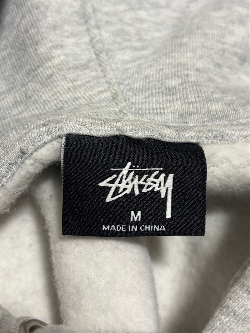 Stüssy グレー パーカー Mサイズ
