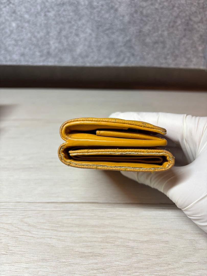 SAINT LAURENT イエロー三つ折り財布