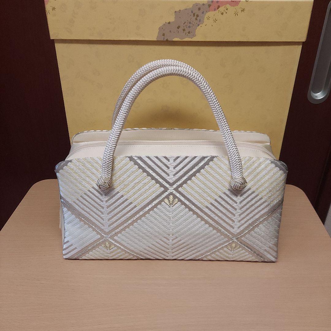 12月7日までのお値下げ　10,000円引　伊と忠　利休バッグ シルバー系 松菱