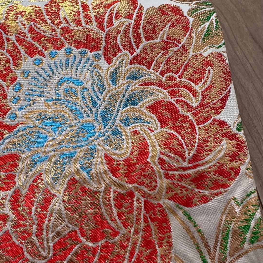 西陣織袋帯未仕立品（株）大光 濃紫地色 大柄花蔓文 芯入仕立代込 新品