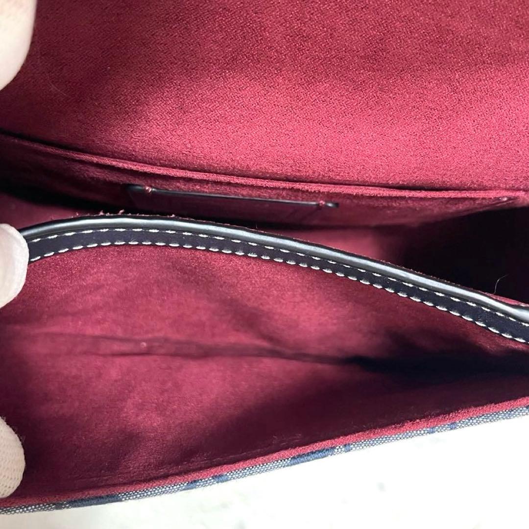 マイメロ✨コーチ ショルダーバッグ ジョージー サドルバッグ シグネチャー