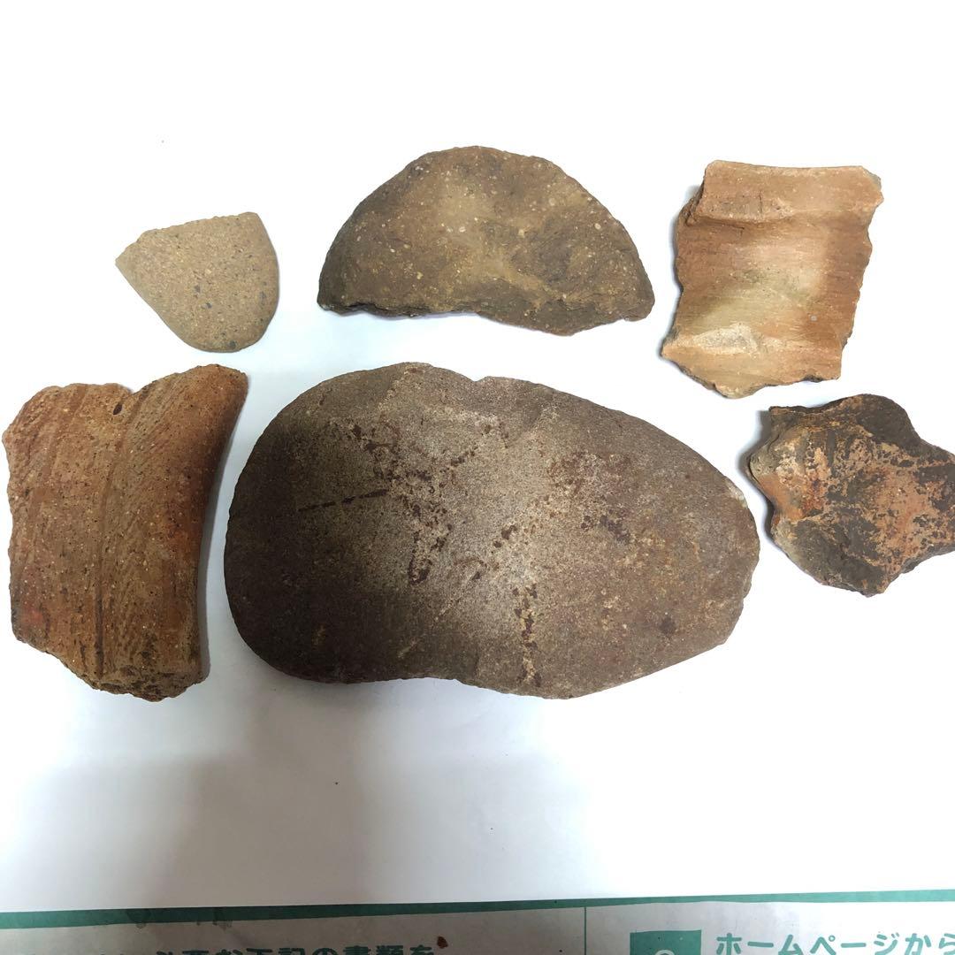 縄文時代の石皿、石斧、土器破片