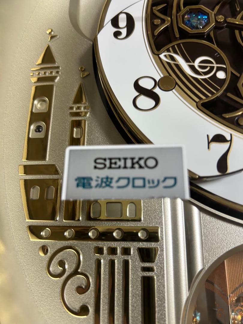 RE579B 電波時計 セイコー 掛時計 壁掛け時計　メロディ機能付き回転飾り