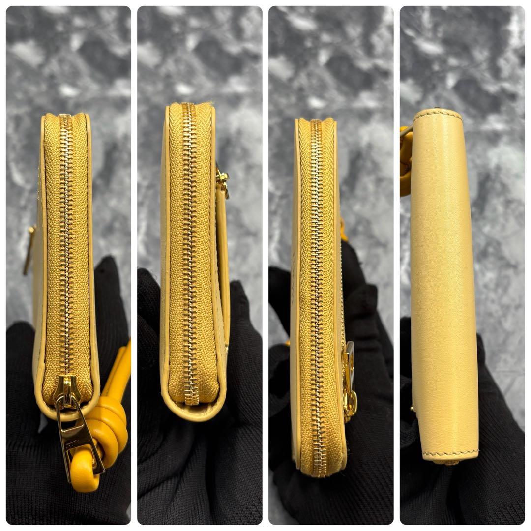 あらいぐま✨LOEWE ノット コンパクトウォレット イエローベージュ 財