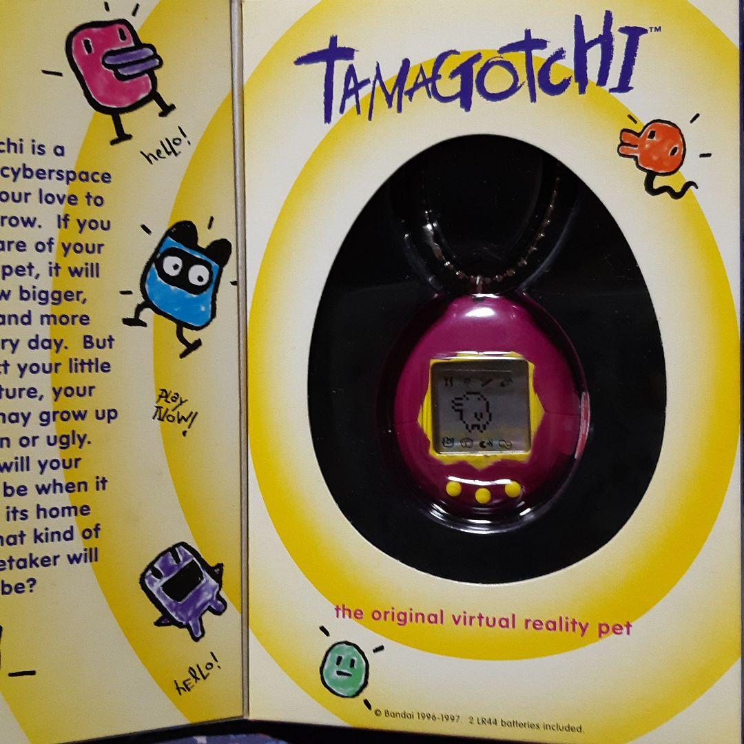 逆輸入版元祖たまごっち(赤紫黄色) - メルカリ