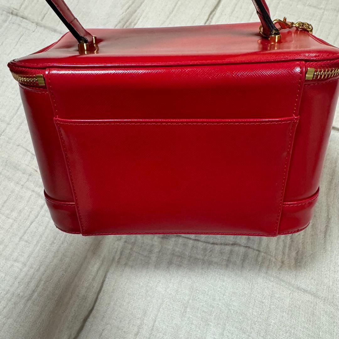 美品 VERSACE レザー バニティバッグ 赤　ファスナー チャーム 太陽