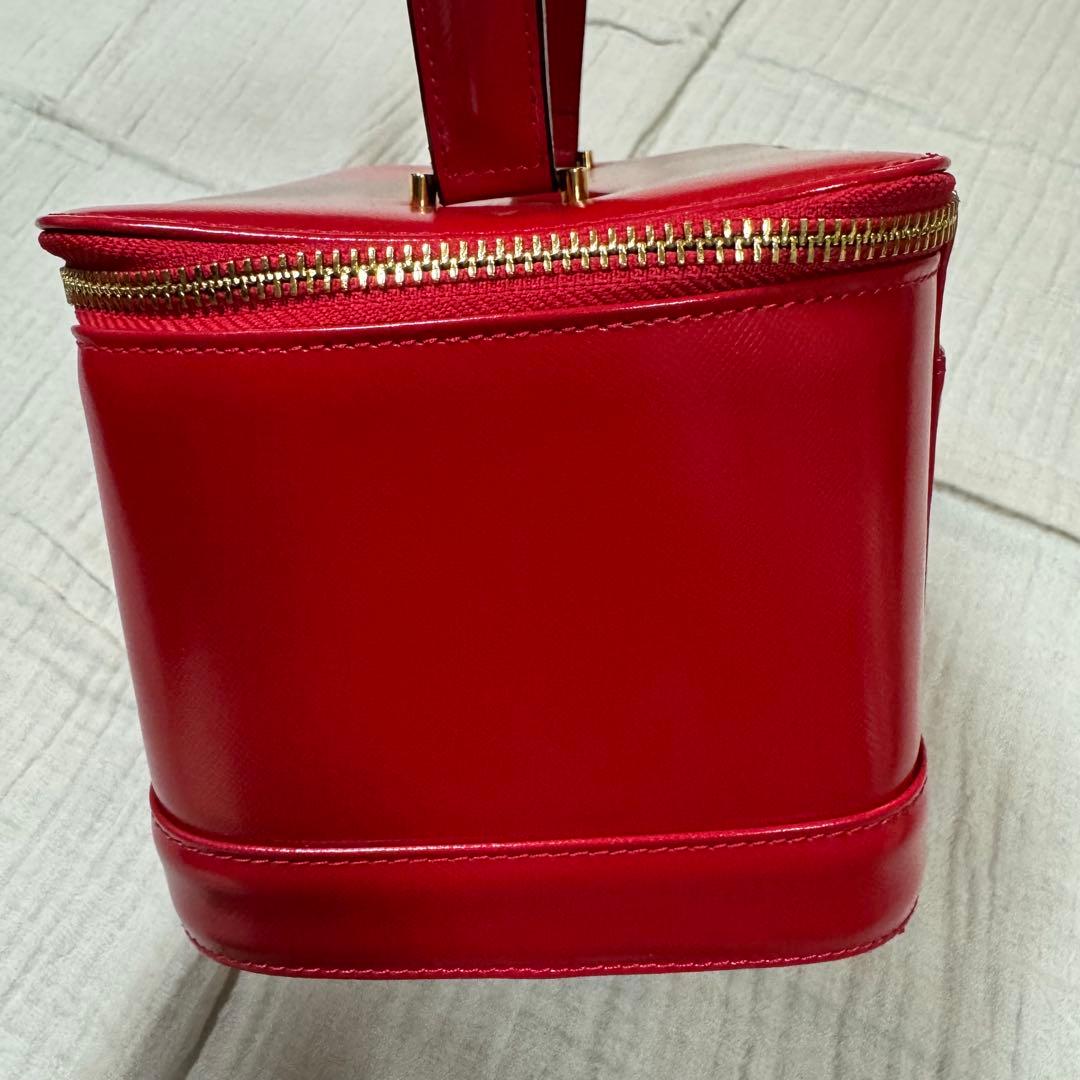 美品 VERSACE レザー バニティバッグ 赤　ファスナー チャーム 太陽
