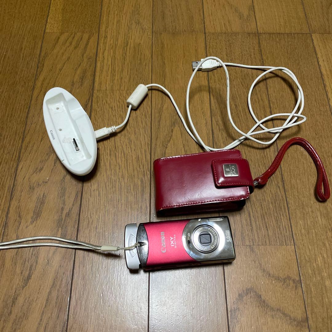 □ジャンク Canon IXY DIGITAL レッド 充電スタンド ケース - メルカリ