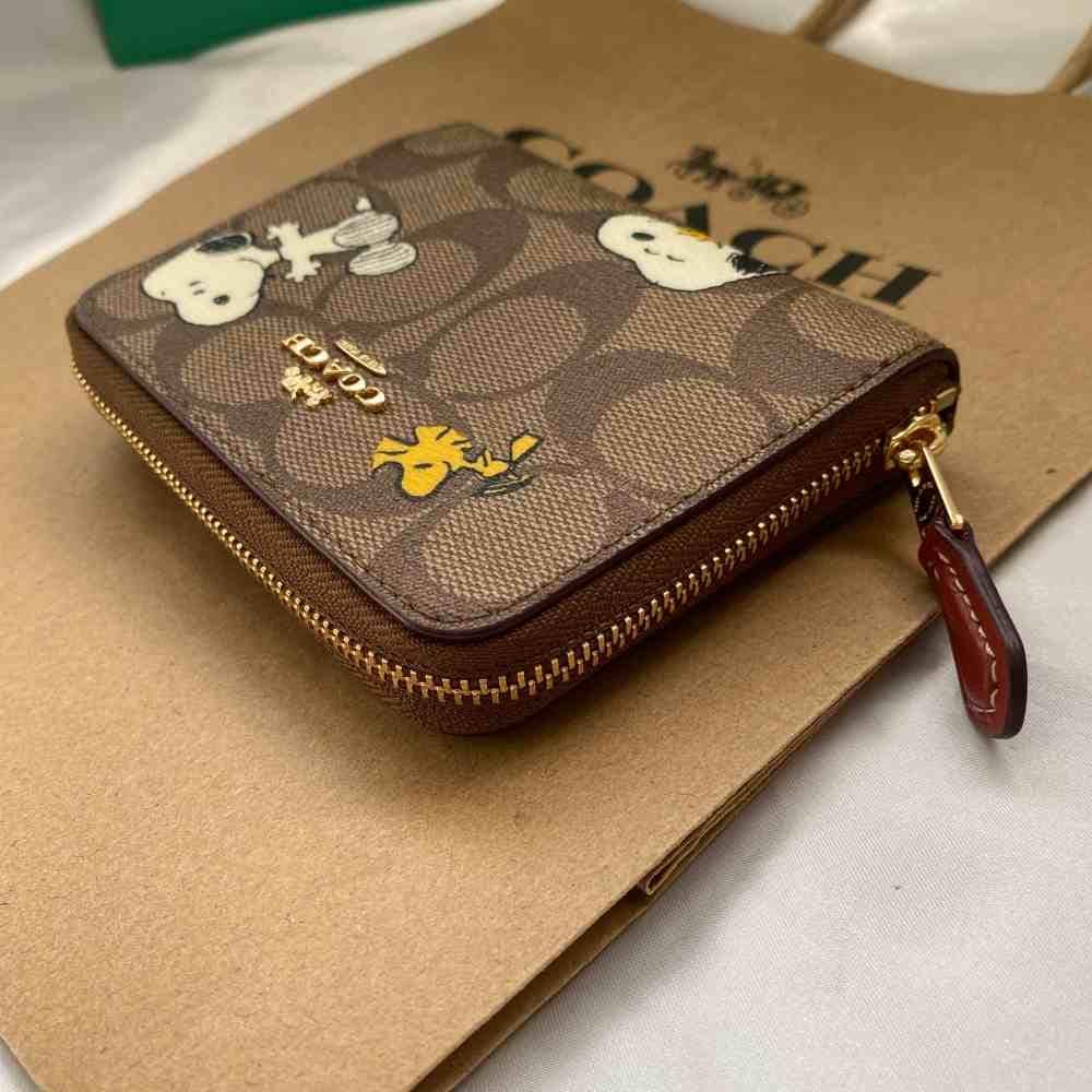 新品 未使用 コーチ スヌーピー コラボ 二つ折り 財布 カーキ - メルカリ