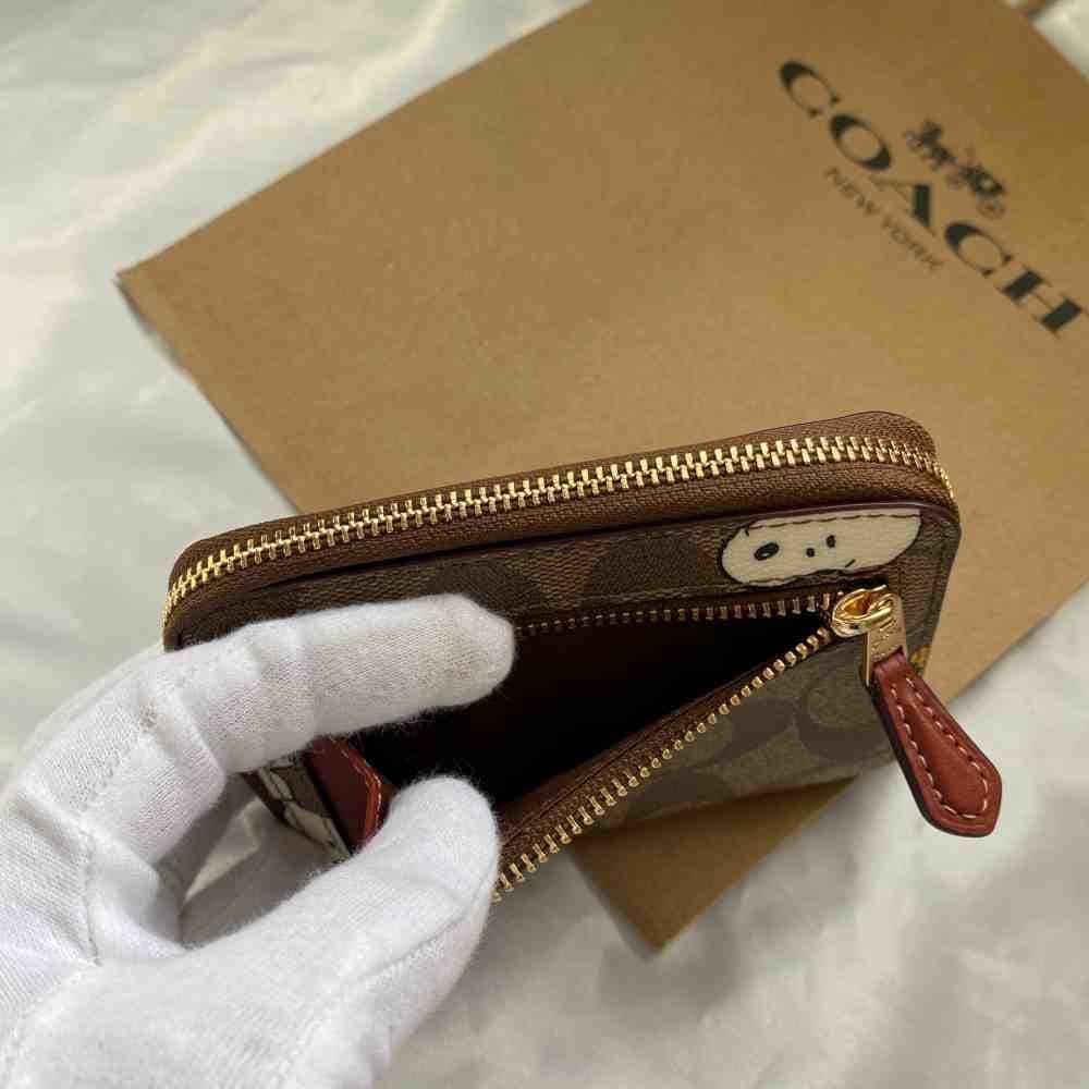 新品 未使用 コーチ スヌーピー コラボ 二つ折り 財布 カーキ - メルカリ
