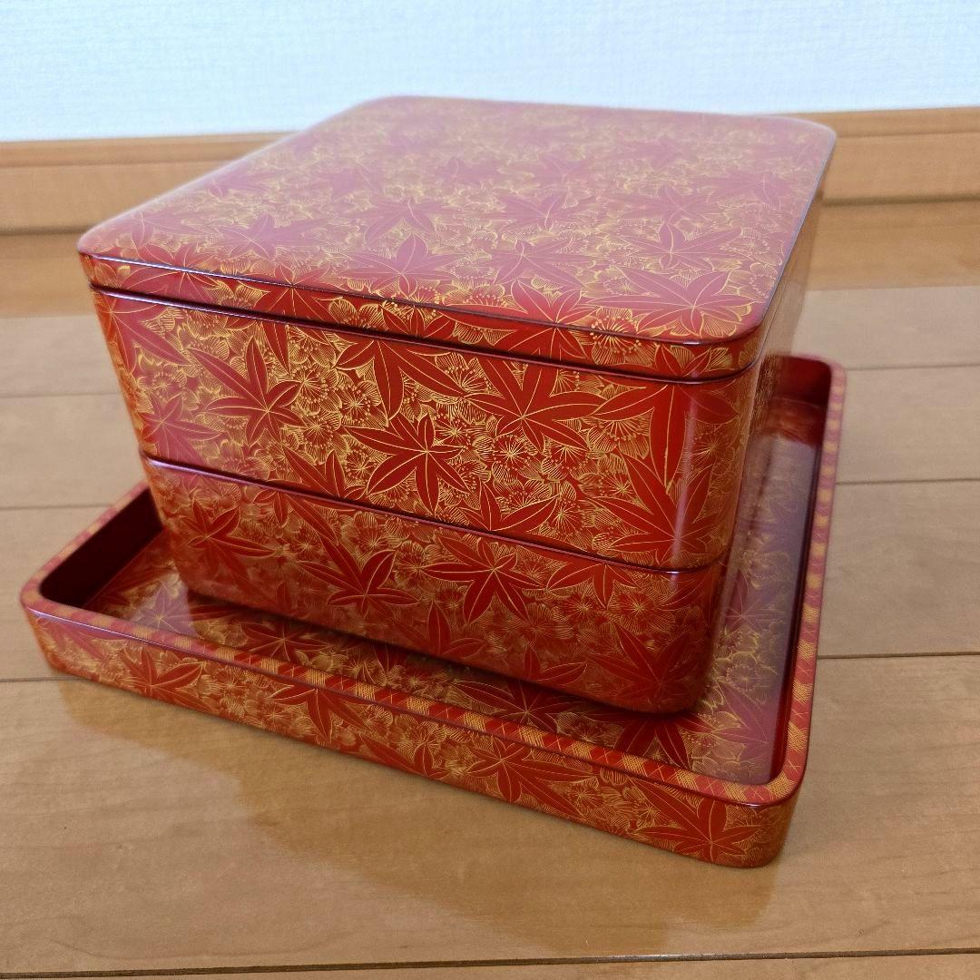 【未使用】輪島塗 四段重 雲錦彫り 詰め網代 沈金 台付き 二枚蓋