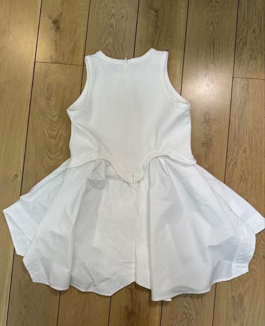 UN3D.タンクトップ ノースリーブ IRREGULAR HEM TT