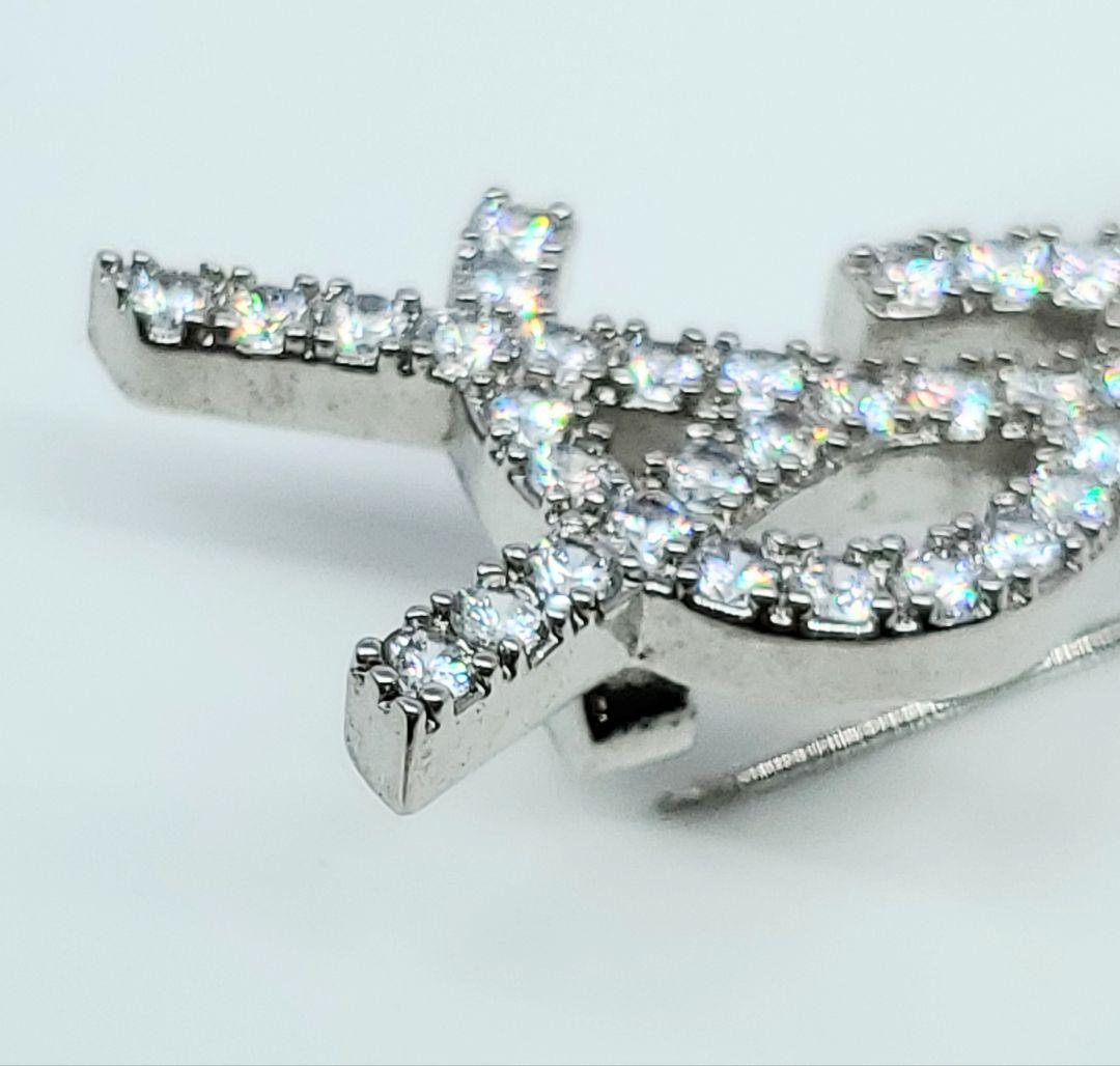 YSL イブサンローラン カサンドラ ロゴ ラインストーン ブローチ