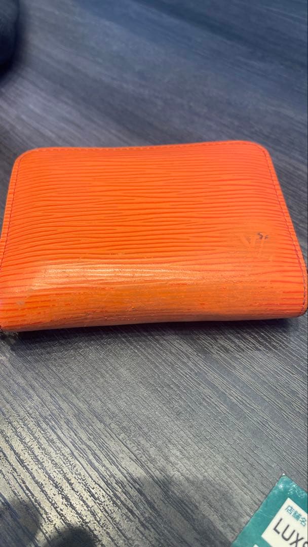 ルイヴィトン エピ ジッピーパース ピモン(オレンジ) M60385