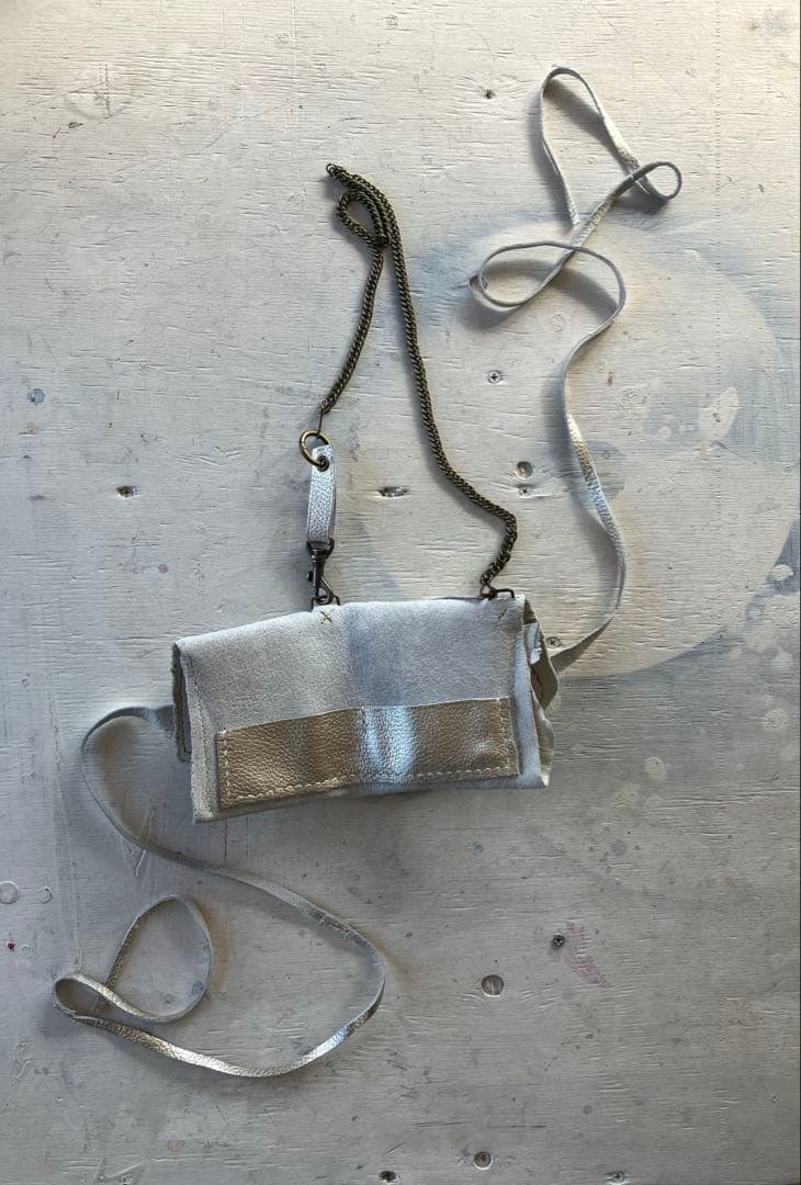 渋金革紐巻く二つ折りたたむネックウォレット＋zipperケース