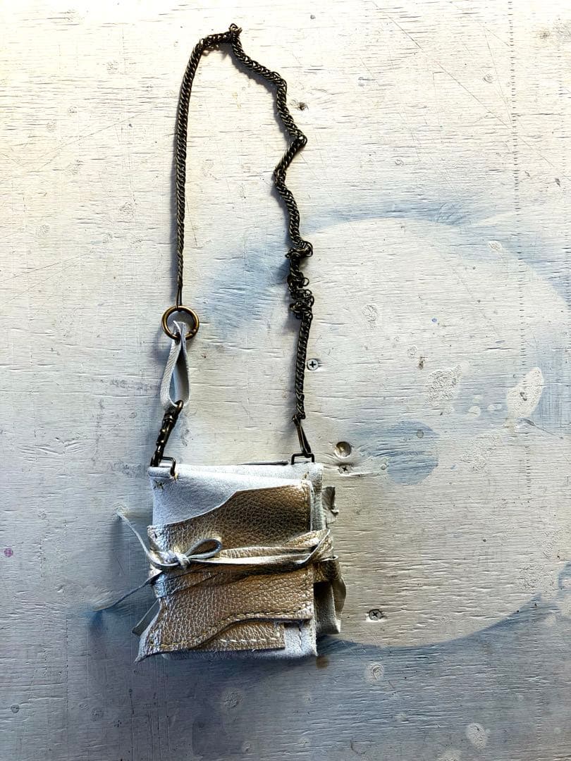 渋金革紐巻く二つ折りたたむネックウォレット＋zipperケース