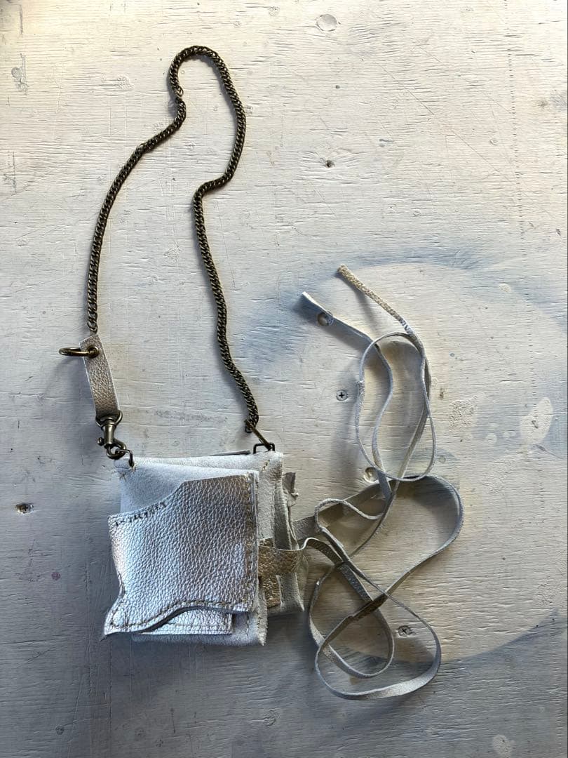 渋金革紐巻く二つ折りたたむネックウォレット＋zipperケース