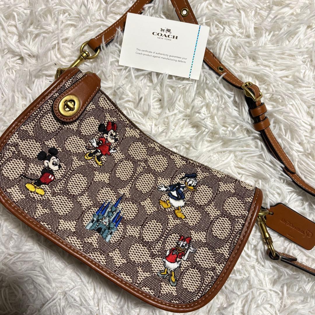 ✨極美品/50周年限定品✨コーチ×ディズニー スゥインガーバッグ ターンロック